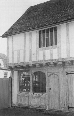 Figure 11 (right). The jettied upper floor, arched ground floor windows and narrow door are typical features of medieval shops (Alston 2004, 40).